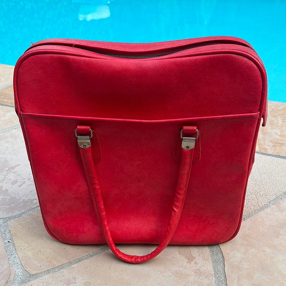 Vintage Courier bag by Sears Roebuck and Company in red-pink